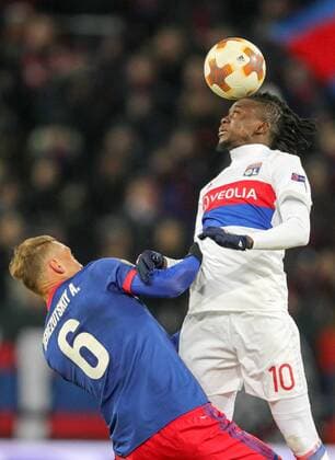MOSCOW, RUSSIA â€“ MARCH 8, 2018: CSKA Moscow s Alexei Berezutsky (L) and Lyon s Bertrand Traore fight for the ball in the first leg of their 2017 18 UEFA Europa League Round of 16 football match at VEB Arena Stadium. Lyon won the game 1-0. Sergei Bobylev TASS  TS07713B
