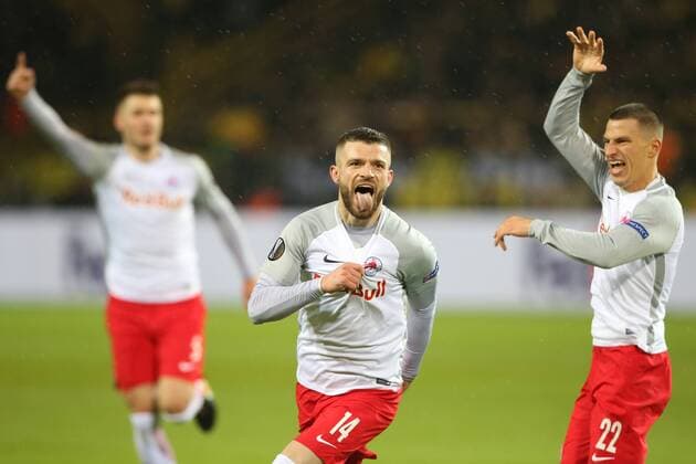 SOCCER - EL, Dortmund vs RBS DORTMUND,GERMANY,08.MAR.18 - SOCCER - UEFA Europa League, last sixteen, Borussia Dortmund vs Red Bull Salzburg. Image shows the rejoicing of Valon Berisha and Stefan Lainer (RBS). GEPAxpictures xMathiasxMandl