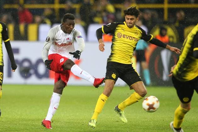 SOCCER - EL, Dortmund vs RBS DORTMUND,GERMANY,08.MAR.18 - SOCCER - UEFA Europa League, last sixteen, Borussia Dortmund vs Red Bull Salzburg. Image shows Diadie Samassekou (RBS) and Mahmoud Dahoud (Dortmund). GEPAxpictures xMathiasxMandl