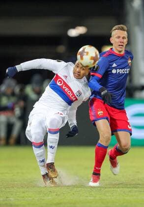 MOSCOW, RUSSIA â€“ MARCH 8, 2018: Lyon s Kenny Tete (L) and CSKA Moscow s Pontus Wernbloom fight for the ball in their 2017 18 UEFA Europa League Round of 16 football match at VEB Arena Stadium. Lyon won the game 1-0. Sergei Bobylev TASS  TS07713C