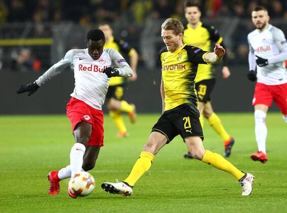 Thursday 08 03 2018 Season 2017 2018 Euro League Round of 16 First leg in Dortmund Signal Iduna Park BVB 09 Borussia Dortmund FC Salzburg Diadie Samassekou FCS against Andre Schuerrle BVB v l