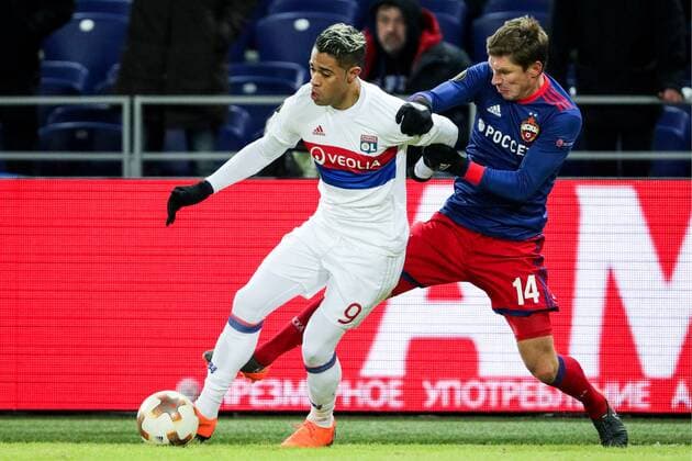 MOSCOW, RUSSIA â€“ MARCH 8, 2018: Lyon s Mariano Diaz (L) and CSKA Moscow s Kirill Nababkin fight for the ball in their 2017 18 UEFA Europa League Round of 16 football match at VEB Arena Stadium. Lyon won the game 1-0. Sergei Bobylev TASS  TS07713E