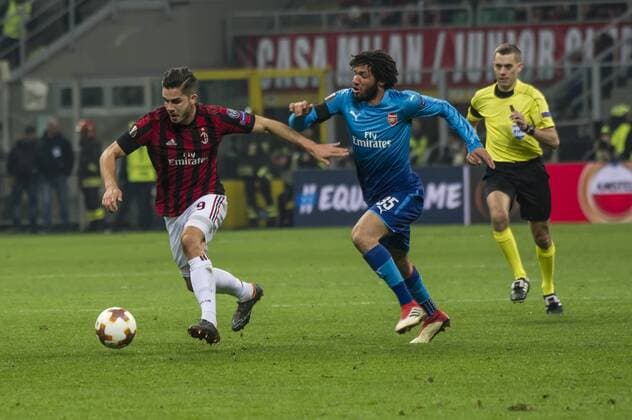 8th March 2018, San Siro, Milan, Italy; UEFA Europa League football, round of 16, 1st leg, AC Milan versus Arsenal FC; Andr& xe8; Silva of AC Milan competes for the ball with Mohamed Elneny of Arsenal  ActionPlus11999369