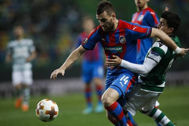 March 8, 2018 - Lisbon, Portugal - Plzen s defender Radim Reznik (L) vies for the ball with Sporting s midfielder Marcos Acuna (R) during UEFA Europa League football match between Sporting CP vs FC Viktoria Plzen, in Lisbon, on March 8, 2018. Sporting Lisbon v Viktoria Plzen - UEFA Europa League Round of 16: First Leg  - ZUMAn230 20180308_zaa_n230_685 Copyright: xCarlosxPalmax