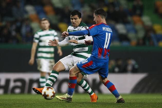 March 8, 2018 - Lisbon, Portugal - Sporting s midfielder Marcos Acuna (L) vies for the ball with Plzen s midfielder Milan Petrzela (R) during UEFA Europa League football match between Sporting CP vs FC Viktoria Plzen, in Lisbon, on March 8, 2018. Sporting Lisbon v Viktoria Plzen - UEFA Europa League Round of 16: First Leg  - ZUMAn230 20180308_zaa_n230_704 Copyright: xCarlosxPalmax