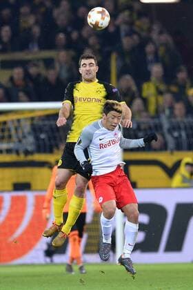 Soccer Europa League Round of 16 Borussia Dortmund FC Salzburg on 08 03 2018 at Signal Iduna Park in Dortmund Hee Chan Hwang Salzburg in front Sokratis Papastathopoulos Dortmund at the back xTTx