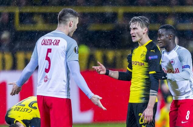 Football UEFA Europa League EL Season 2017 2018 Eighth finals Borussia Dortmund RB Salzburg in Dortmund North Rhine Westphalia Dortmunds Maximilian Philipp struggles with Salzburgs Duje Caleta Car l Copyright: xKirchner DavidxInderliedx