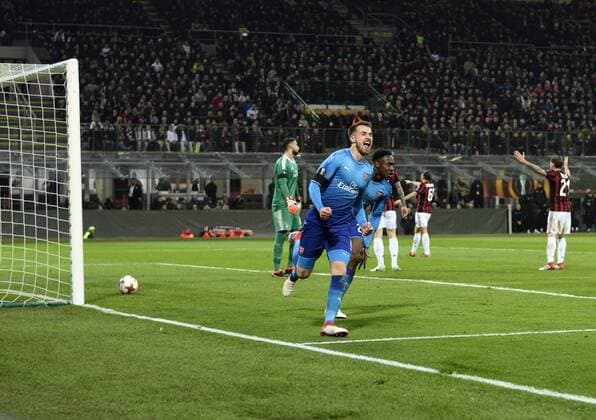 (180309) -- MILAN, March 9, 2018 -- Arsenal s Aaron Ramsey (Front) celebrates after he scores a goal during a Europa League round of 16 first leg soccer match between AC Milan and Arsenal at the San Siro stadium in Milan, Italy, March 8, 2018. Arsenal won 2-0. ) (SP)ITALY-MILAN-EUROPA LEAGUE-AC MILAN VS ARSENAL AlbertoxLingria 