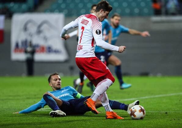 (180309) -- LEIPZIG, March 9, 2018 -- Leipzig s Marcel Sabitzer (Top) vies with Zenit s Domenico Criscito during a Europa League round of 16 first-leg soccer match between RB Leipzig of Germany and Zenit St. Petersburg of Russia, in Leipzig, Germany, on March 8, 2018. Leipzig won 2-1. ) (SP)GERMANY-LEIPZIG-SOCCER-UEFA EUROPA LEAGUE-LEIPZIG VS ZENIT ShanxYuqi 