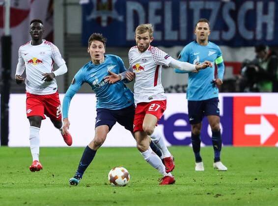 (180309) -- LEIPZIG, March 9, 2018 -- Leipzig s Konrad Laimer (Front R) vies with Zenit s Daler Kuzyaev (Front L) during a Europa League round of 16 first-leg soccer match between RB Leipzig of Germany and Zenit St. Petersburg of Russia, in Leipzig, Germany, on March 8, 2018. Leipzig won 2-1. ) (SP)GERMANY-LEIPZIG-SOCCER-UEFA EUROPA LEAGUE-LEIPZIG VS ZENIT ShanxYuqi 