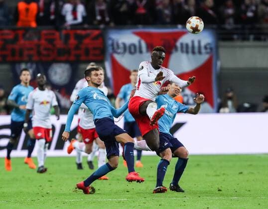 (180309) -- LEIPZIG, March 9, 2018 -- Leipzig s Jean-Kevin Augustin (Front C) vies with Zenit s Emanuel Mammana (Front L) and Matias Kranevitter (Front R) during a Europa League round of 16 first-leg soccer match between RB Leipzig of Germany and Zenit St. Petersburg of Russia, in Leipzig, Germany, on March 8, 2018. Leipzig won 2-1. ) (SP)GERMANY-LEIPZIG-SOCCER-UEFA EUROPA LEAGUE-LEIPZIG VS ZENIT ShanxYuqi 