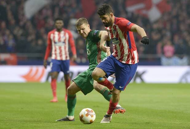 March 8, 2018 - Madrid, Spain - Diego Costa of Atletico de Madrid figth the ball with Denisov during UEFA Europa League Round of 16 match between Atletico Madrid and FC Lokomotiv at the Wanda Metropolitano on March 08, 2018 in Madrid, Spain. ChakanaNews-Pressouth Atletico Madrid v Lokomotiv Moscow - UEFA Europa League Round of 16: First Leg  - ZUMAn230 20180308_zaa_n230_1059 Copyright: xPatricioxRealpex