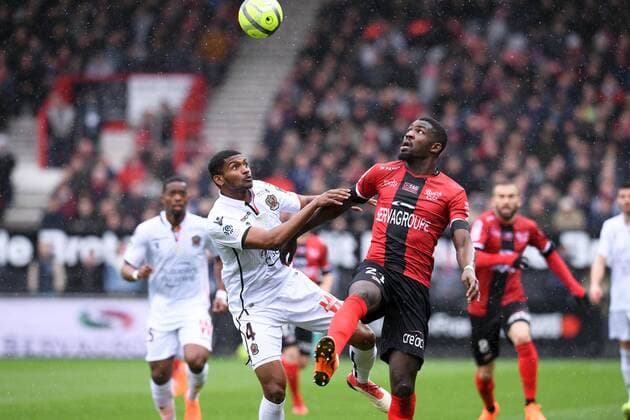 21 Marcus THURAM (gui) - 04 Santos MARLON (nice) FOOTBALL : Guingamp vs Nice - Ligue 1 Conforama - 11 03 2018 FEP Panoramic 