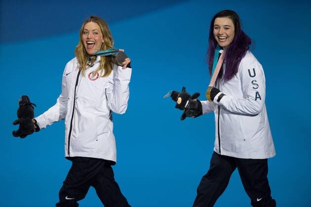 March 12, 2018 - Pyeongchang, South Korea - Gold medalist Brenna Huckaby of the US, right, and teammate Amy Purdy (silver) celebrate during a medal ceremony for Women s Snowboard Cross Monday, March 12, 2018 at the Medals Plaza for the 2018 Pyeongchang Winter Paralympic Games. Paralympics PyeongChang 18: Snowboard - ZUMAr157 20180312_zap_r157_034 Copyright: xMarkxReisx