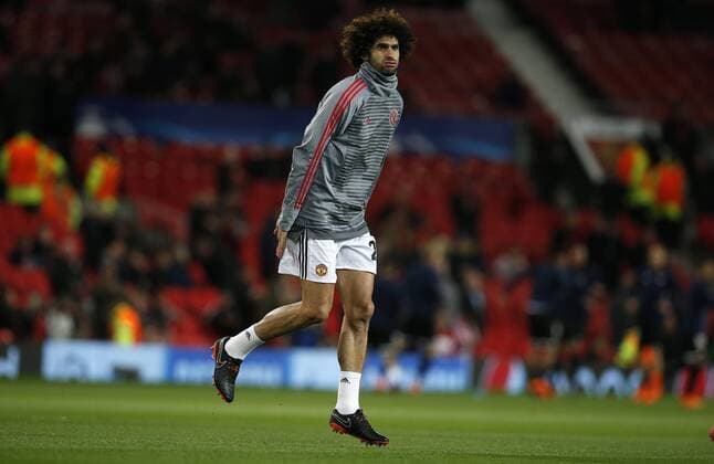 Marouane Fellaini of Manchester United ManU warms up before the Champions League Round of 16 match at Old Trafford Stadium, Manchester. Picture date: March 13th 2018. Picture credit should read: Andrew Yates Sportimage EDITORIAL USE ONLY. No use with unauthorised audio, video, data, fixture lists, club league logos or live services. Online in-match use limited to 120 images, no video emulation. No use in betting, games or single club league player publications.