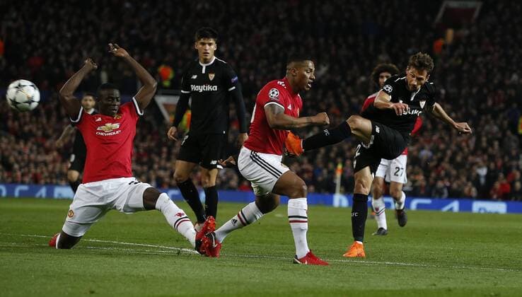 Franco Vazquez of Sevilla has a shot on goal during the Champions League Round of 16 match at Old Trafford Stadium, Manchester. Picture date: March 13th 2018. Picture credit should read: Andrew Yates Sportimage EDITORIAL USE ONLY. No use with unauthorised audio, video, data, fixture lists, club league logos or live services. Online in-match use limited to 120 images, no video emulation. No use in betting, games or single club league player publications.