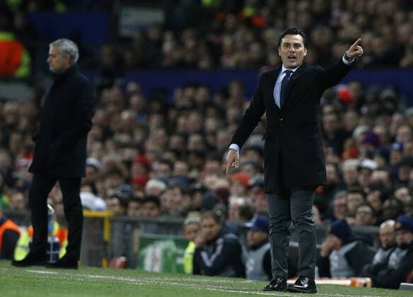 Jose Mourinho manager of Manchester United ManU and Vincenzo Montella manager of Sevilla on the touchline during the Champions League Round of 16 match at Old Trafford Stadium, Manchester. Picture date: March 13th 2018. Picture credit should read: Andrew Yates Sportimage EDITORIAL USE ONLY. No use with unauthorised audio, video, data, fixture lists, club league logos or live services. Online in-match use limited to 120 images, no video emulation. No use in betting, games or single club league player publications.