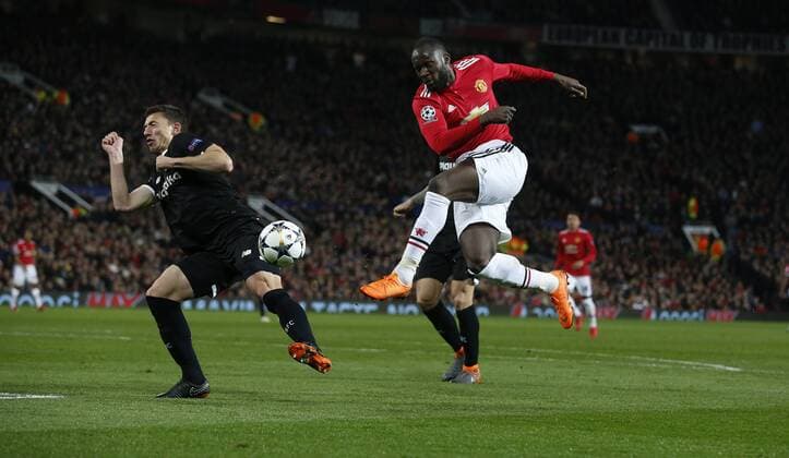 Clement Lenglet of Sevilla blocks a shot from Romelu Lukaku of Manchester United ManU during the Champions League Round of 16 match at Old Trafford Stadium, Manchester. Picture date: March 13th 2018. Picture credit should read: Andrew Yates Sportimage EDITORIAL USE ONLY. No use with unauthorised audio, video, data, fixture lists, club league logos or live services. Online in-match use limited to 120 images, no video emulation. No use in betting, games or single club league player publications.