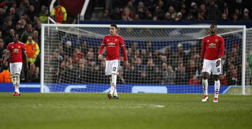 Bilder des Tages - SPORT Eric Bailly, Chris Smalling and Paul Pogba of Manchester United ManU react after Wissam Ben Yedder of Sevilla opens the scoring during the Champions League Round of 16 match at Old Trafford Stadium, Manchester. Picture date: March 13th 2018. Picture credit should read: Andrew Yates Sportimage EDITORIAL USE ONLY. No use with unauthorised audio, video, data, fixture lists, club league logos or live services. Online in-match use limited to 120 images, no video emulation. No use in betting, games or single club league player publications.