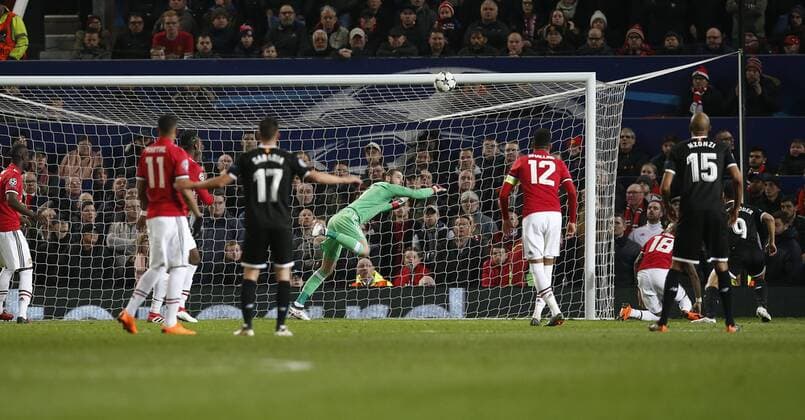 Wissam Ben Yedder of Sevilla scores his second goal past David De Gea of Manchester United ManU during the Champions League Round of 16 match at Old Trafford Stadium, Manchester. Picture date: March 13th 2018. Picture credit should read: Andrew Yates Sportimage EDITORIAL USE ONLY. No use with unauthorised audio, video, data, fixture lists, club league logos or live services. Online in-match use limited to 120 images, no video emulation. No use in betting, games or single club league player publications.