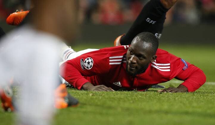 Romelu Lukaku of Manchester United ManU down and out during the Champions League Round of 16 match at Old Trafford Stadium, Manchester. Picture date: March 13th 2018. Picture credit should read: Andrew Yates Sportimage EDITORIAL USE ONLY. No use with unauthorised audio, video, data, fixture lists, club league logos or live services. Online in-match use limited to 120 images, no video emulation. No use in betting, games or single club league player publications.