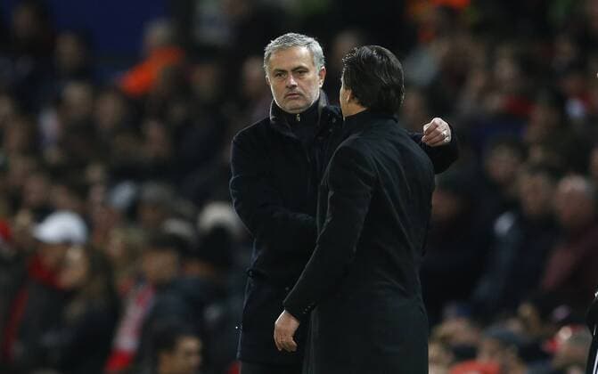 Jose Mourinho manager of Manchester United ManU and Vincenzo Montella manager of Sevilla after the Champions League Round of 16 match at Old Trafford Stadium, Manchester. Picture date: March 13th 2018. Picture credit should read: Andrew Yates Sportimage EDITORIAL USE ONLY. No use with unauthorised audio, video, data, fixture lists, club league logos or live services. Online in-match use limited to 120 images, no video emulation. No use in betting, games or single club league player publications.