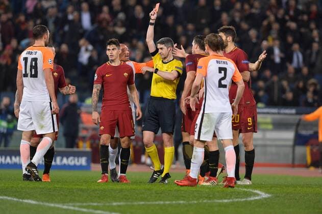 March 13, 2018 - Rome, Italy - Expulsion of Ivan Ordets for a foul on Edin Dzeko during the Champions League football match A.S. Roma vs Shakhtar Donetsk at the Olympic Stadium in Rome, on march 13, 2018. AS Roma v Shakhtar Donetsk - UEFA Champions League Round of 16: Second Leg  - ZUMAn230 20180313_zaa_n230_475 Copyright: xSilviaxLorex