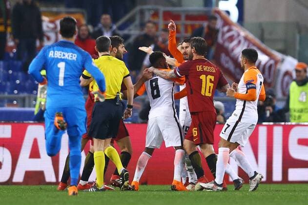 March 13, 2018 - Rome, Italy - AS Roma v FC Shakhtar Donetsk : UEFA Champions League Round of 16 Second leg.Hard discussion between the two teams at Olimpico Stadium in Rome, Italy on March 13, 2018. AS Roma v Shakhtar Donetsk - UEFA Champions League Round of 16: Second Leg  - ZUMAn230 20180313_zaa_n230_502 Copyright: xMatteoxCiambellix