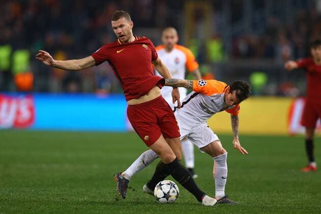March 13, 2018 - Rome, Italy - AS Roma v FC Shakhtar Donetsk : UEFA Champions League Round of 16 Second leg.Edin Dzeko of Roma and Bernard of Shakhtar Donetsk at Olimpico Stadium in Rome, Italy on March 13, 2018. AS Roma v Shakhtar Donetsk - UEFA Champions League Round of 16: Second Leg  - ZUMAn230 20180313_zaa_n230_504 Copyright: xMatteoxCiambellix