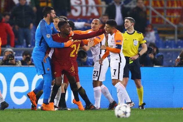 March 13, 2018 - Rome, Italy - AS Roma v FC Shakhtar Donetsk : UEFA Champions League Round of 16 Second leg.Hard discussion between Gerson of Roma and Taison of Shakhtar Donetsk at Olimpico Stadium in Rome, Italy on March 13, 2018. AS Roma v Shakhtar Donetsk - UEFA Champions League Round of 16: Second Leg  - ZUMAn230 20180313_zaa_n230_512 Copyright: xMatteoxCiambellix