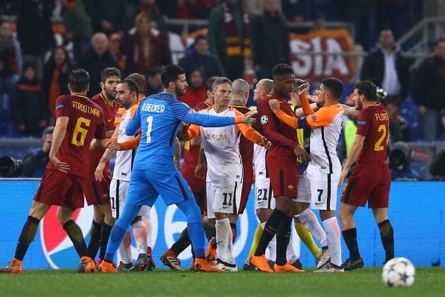 March 13, 2018 - Rome, Italy - AS Roma v FC Shakhtar Donetsk : UEFA Champions League Round of 16 Second leg.Hard discussion between Gerson of Roma and Taison of Shakhtar Donetsk at Olimpico Stadium in Rome, Italy on March 13, 2018. AS Roma v Shakhtar Donetsk - UEFA Champions League Round of 16: Second Leg  - ZUMAn230 20180313_zaa_n230_514 Copyright: xMatteoxCiambellix