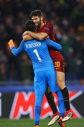 March 13, 2018 - Rome, Italy - AS Roma v FC Shakhtar Donetsk : UEFA Champions League Round of 16 Second leg.Alisson Becker and Federico Fazio of Roma celebrate at Olimpico Stadium in Rome, Italy on March 13, 2018. AS Roma v Shakhtar Donetsk - UEFA Champions League Round of 16: Second Leg  - ZUMAn230 20180313_zaa_n230_520 Copyright: xMatteoxCiambellix