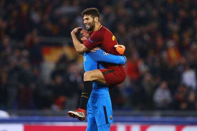 March 13, 2018 - Rome, Italy - AS Roma v FC Shakhtar Donetsk : UEFA Champions League Round of 16 Second leg.Alisson Becker and Federico Fazio of Roma celebrate at Olimpico Stadium in Rome, Italy on March 13, 2018. AS Roma v Shakhtar Donetsk - UEFA Champions League Round of 16: Second Leg  - ZUMAn230 20180313_zaa_n230_521 Copyright: xMatteoxCiambellix
