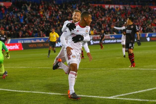 HARRISON, NJ - MARCH 13: New York Red Bulls midfielder Tyler Adams (4) celebrates with teammate New York Red Bulls midfielder Daniel Royer (77) after he scores during the first half of the CONCACAF Champions League Quarter-final match between the New York Red Bulls and Club Tijuana on March 13, 2018, at Red Bull Arena in Harrison, NJ. (Photo by Rich Graessle Icon Sportswire) SOCCER: MAR 13 CONCACAF CHAMPIONS LEAGUE - CLUB TIJUANA AT NEW YORK RED BULLS Icon0313183215 EDITORIAL USE ONLY