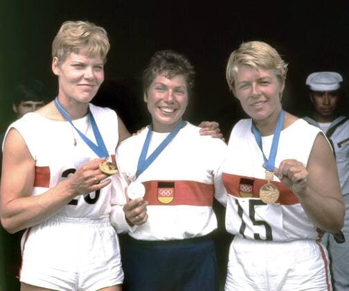 1968 Olympic Games in Mexico City Annemarie Zimmermann li and Roswitha Esser re Gold in a 2-kayak take the silver medal winner in a Renate Breuer all Germany in the middle and present their medals 24 10 1968 HM