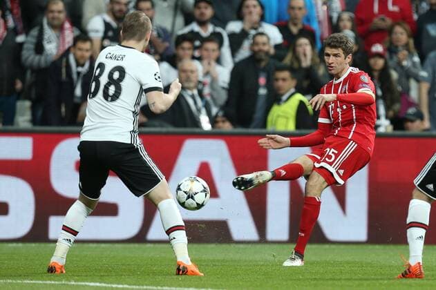 In action with Caner Erkin 88 Besiktas Istanbul and Thomas Mueller 25 Bayern Munich Besiktas Istanbul vs Bayern Munich Soccer Eighth-final Champions League 14 03 2018 Istanbul Istanbul Turkey Copyright: xkolbert-press ChristianxKolbertx