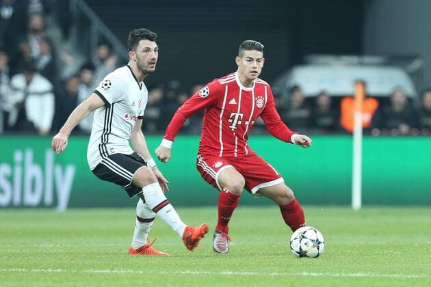 In action with Tolgay Arslan 18 Besiktas Istanbul and James Rodriguez 11 Bayern Munich Besiktas Istanbul vs Bayern Munich Soccer Eighth-final Champions League 14 03 2018 Istanbul Istanbul Turkey Copyright: xkolbert-press ChristianxKolbertx