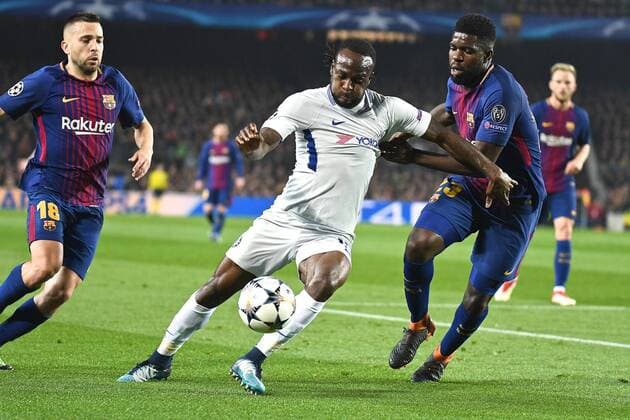 FC Barcelona Barca v Chelsea UEFA Champions League Victor Moses of Chelsea (centre) holds off Samuel Umtiti of FC Barcelona during the UEFA Champions League match at Camp Nou, Barcelona Content Not Available For UK Newspapers Copyright: xKristianxKanex FIL-11502-0049