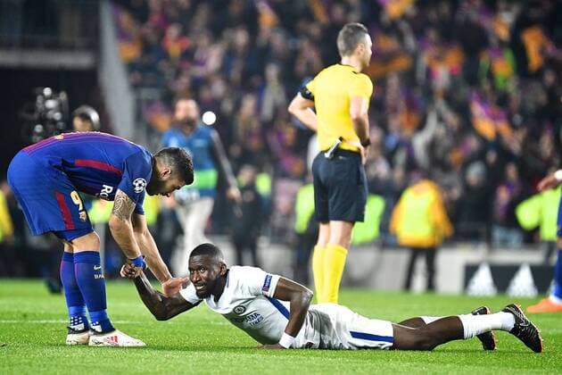 FC Barcelona Barca v Chelsea UEFA Champions League Luis Suarez of FC Barcelona (left) consoles Antonio R?diger of Chelsea as he lies on the floor in disappointment as Chelsea are knocked out of the Champions League by FC Barcelona pictured ahead of the UEFA Champions League match at Camp Nou, Barcelona Content Not Available For UK Newspapers Copyright: xKristianxKanex FIL-11502-0088