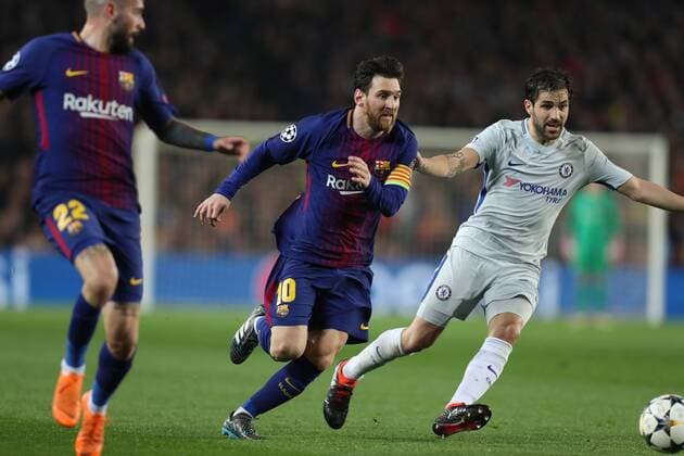 March 14, 2018 - Barcelona, Spain - LIONEL MESSI of FC Barcelona Barca evades CESC FABREGAS of Chelsea FC during the UEFA Champions League, round of 16, 2nd leg football match between FC Barcelona and Chelsea FC on March 14, 2018 at Camp Nou stadium in Barcelona, Spain Football - UEFA Champions League - FC Barcelona vs Chelsea FC  - ZUMAb169 20180314_zaa_b169_028 Copyright: xManuelxBlondeau Aop.Pressx