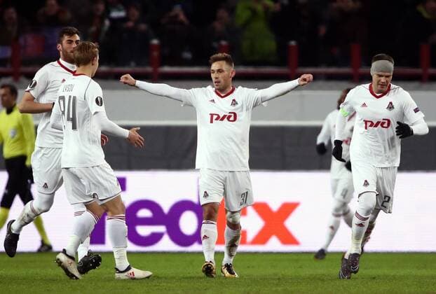 MOSCOW, RUSSIA - MARCH 15, 2018: Lokomotiv Moscow s Maciej Rybus celebrates scoring in the 2017-2018 UEFA Europa League Round of 16 second leg football match against Atletico Madrid at RZD Arena (Lokomotiv Stadium). Valery Sharifulin TASS  TS077E0A