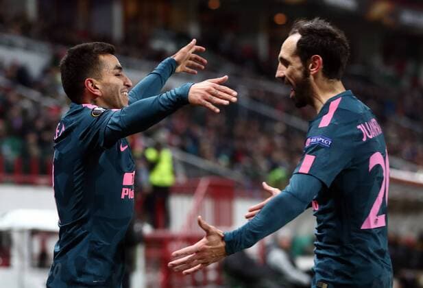 MOSCOW, RUSSIA - MARCH 15, 2018: Atletico Madrid s Angel Correa (L) and Juanfran celebrate scoring in the 2017-2018 UEFA Europa League Round of 16 second leg football match against Lokomotiv Moscow at RZD Arena (Lokomotiv Stadium). Valery Sharifulin TASS  TS077E0D
