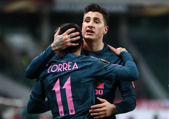 MOSCOW, RUSSIA - MARCH 15, 2018: Atletico Madrid s Angel Correa (L) and Jose Maria Gimenez celebrate scoring in the 2017-2018 UEFA Europa League Round of 16 second leg football match against Lokomotiv Moscow at RZD Arena (Lokomotiv Stadium). Valery Sharifulin TASS  TS077E12