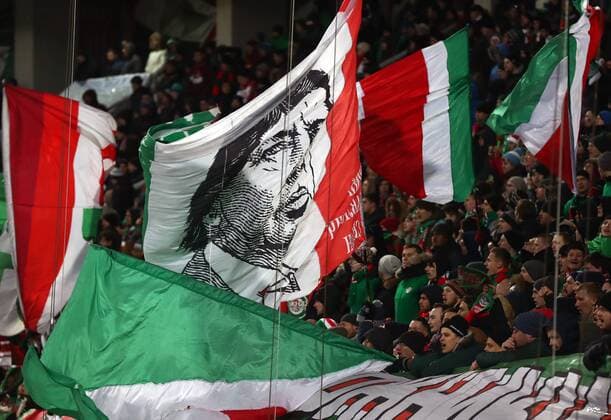 MOSCOW, RUSSIA - MARCH 15, 2018: Lokomotiv Moscow s fans root for their team in the 2017-2018 UEFA Europa League Round of 16 second leg football match against Atletico Madrid at RZD Arena (Lokomotiv Stadium). Valery Sharifulin TASS  TS077E2B