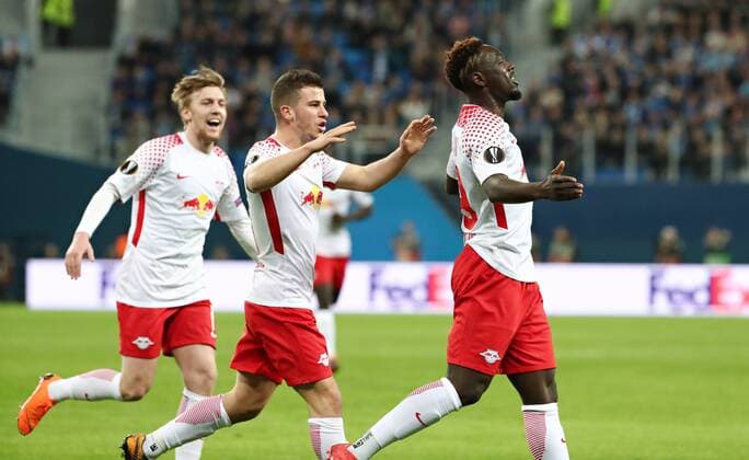 St Petersburg RB Leipzig Soccer Euro League St Petersburg 15 03 2018 Krestowski Stadium Soccer UEFA Euro League Round of 16 Relegation FK Zenit St Petersburg vs. RB Leipzig Leipzig goal celebrations after the 0 1 Pictured left Emil Forsberg 10 RB Leipzig Diego Demme 31 RB Leipzig and goalscorer Jean Kevin Augustin 29 RB Leipzig