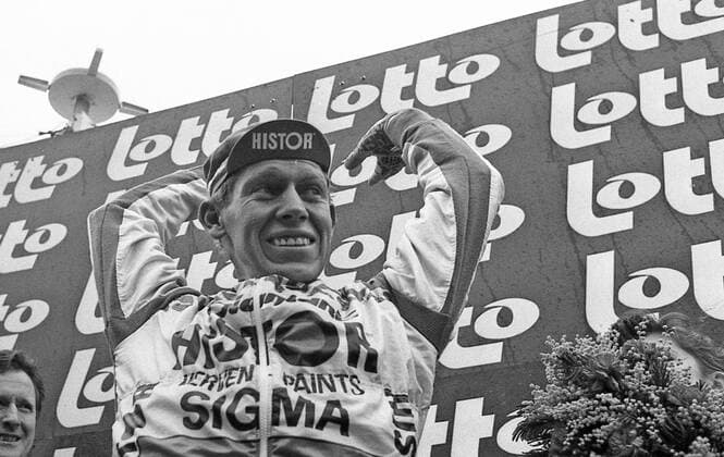 - GENT, BELGIUM: File picture dated 04 March 1989 shows Etienne De Wilde celebrating on the podium after winning the Omloop Het Volk cycling race ahead of Sean Kelly. BELGAxARCHIVES  x74599485x