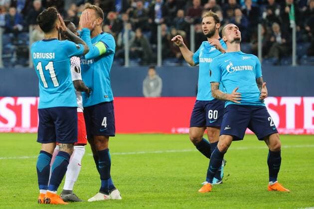 ST PETERSBURG, RUSSIA - MARCH 15, 2018: Zenit St Petersburg s Sebastian Driussi, Domenico Criscito, Branislav Ivanovic and Anton Zabolotny (L-R) in the 2017-2018 UEFA Europa League Round of 16 second leg football match against RB Leipzig at Saint Petersburg Stadium. Alexander Demianchuk TASS  TS077E6F