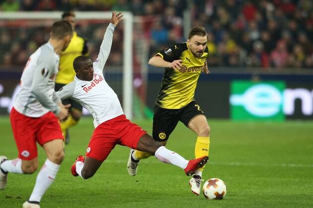 SOCCER - UEFA EL, RBS vs Dortmund SALZBURG,AUSTRIA,15.MAR.18 - SOCCER - UEFA Europa League, round of 16, Red Bull Salzburg vs Borussia Dortmund. Image shows Amadou Haidara (RBS) and Marcel Schmelzer (Dortmund). GEPAxpictures xMathiasxMandl