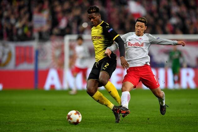 SOCCER - UEFA EL, RBS vs Dortmund SALZBURG,AUSTRIA,15.MAR.18 - SOCCER - UEFA Europa League, round of 16, Red Bull Salzburg vs Borussia Dortmund. Image shows Dan Axel Zagadou (Dortmund) and Hee Chan Hwang (RBS). GEPAxpictures xFlorianxErtl