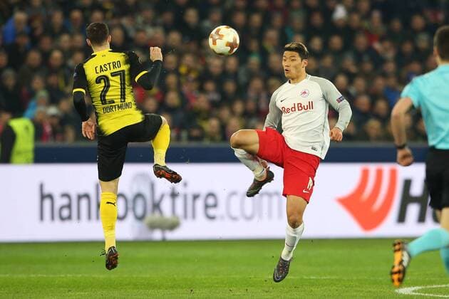 SOCCER - UEFA EL, RBS vs Dortmund SALZBURG,AUSTRIA,15.MAR.18 - SOCCER - UEFA Europa League, round of 16, Red Bull Salzburg vs Borussia Dortmund. Image shows Hee Chan Hwang (RBS) and Gonzalo Castro (Dortmund). GEPAxpictures xMathiasxMandl